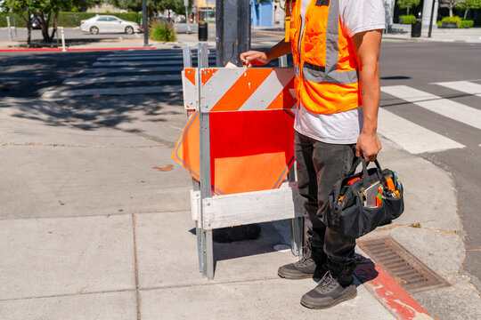 construction worker road sign tools