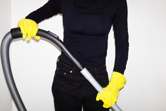  Cleaning hoovering vacuuming with vacuum cleaner with cleaning gloves