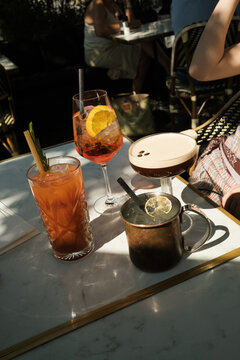 Colorful drinks on a table at a cafe in the afternoon