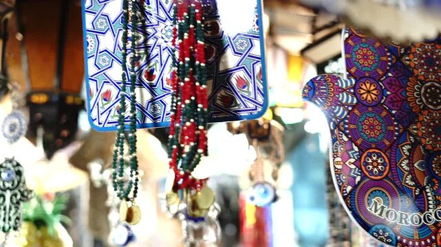 Colorful Moroccan Souk Souvenirs Featuring Hamsa Hand, Evil Eye Charms, and Traditional Lanterns