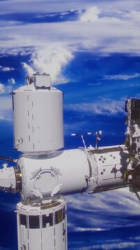 The space station orbits Earth, surrounded by clouds and a blue sky. This scene is from a view taken from space during daylight.
