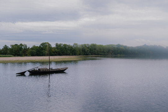 Traditional boat in the mist