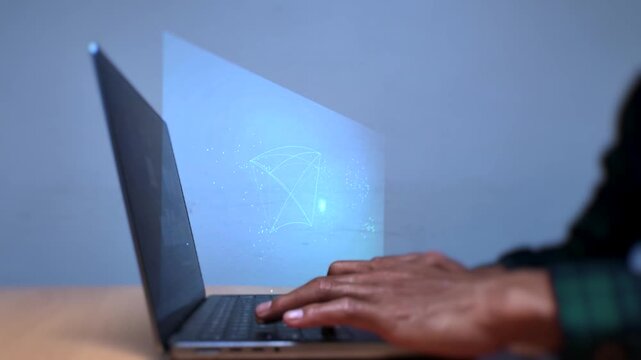 Person typing on laptop keyboard with holographic global network shield map projection representing digital privacy data protection and modern cybersecurity technology concept.