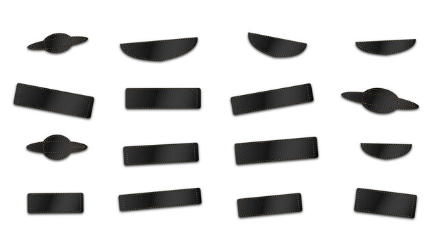 A set of dark grey geometric shapes including rectangles, ellipses, and ringed planet displayed on a solid black background surface