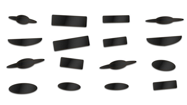 A set of dark grey geometric shapes including rectangles, ellipses, and ringed planet displayed on a solid black background surface