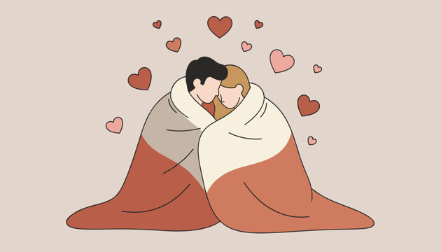 Loving couple wrapped together in a cozy blanket shares a romantic hug surrounded by red hearts on a warm background.