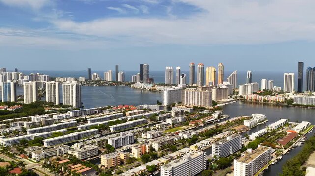Aerial video flight over Eastern Shores with views of Sunny Isles Beach supertall condominiums