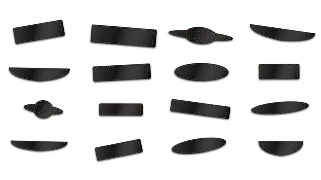 Set of various dark grey metallic geometric including rectangles and ringed circles on a plain black background, surface layout
