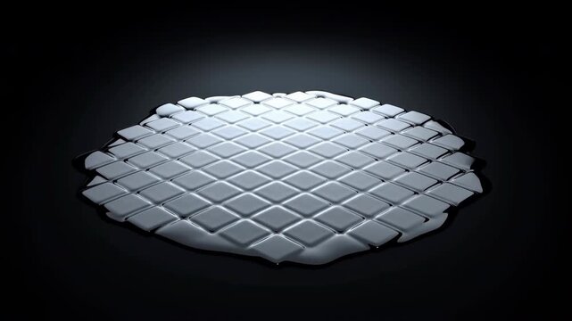 White rounded tiles spread outward from a compact raised cluster into a broad circular grid, forming an orderly geometric surface under focused light on a dark background