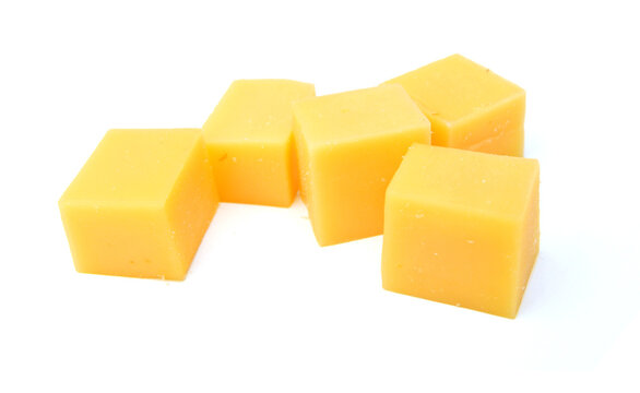 Piece of cheese isolated on a white background