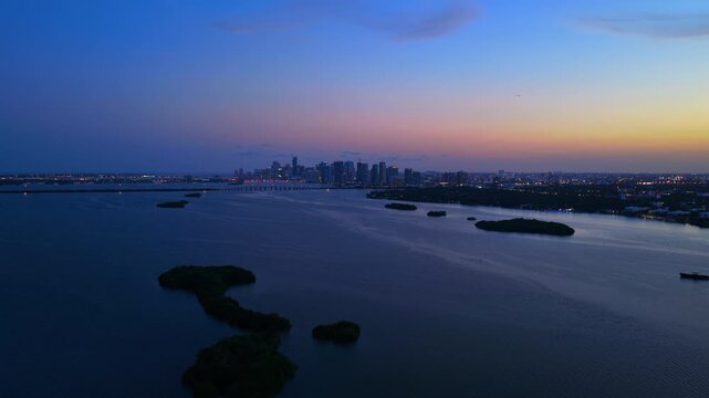 Slow night aerial approach Downtown Miami
