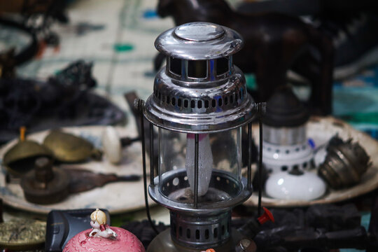 Vintage pressure lantern displayed at antique flea market close up