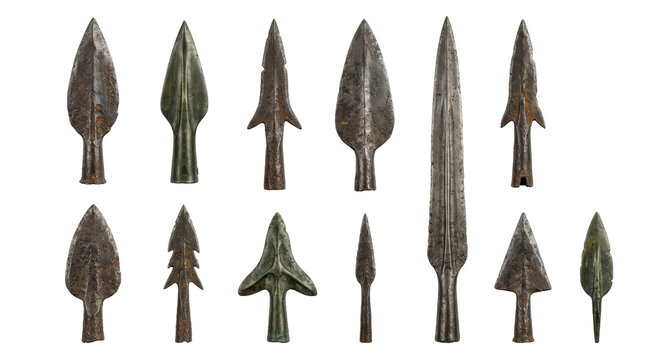 Collection of ancient metal arrowheads and spear points from various eras