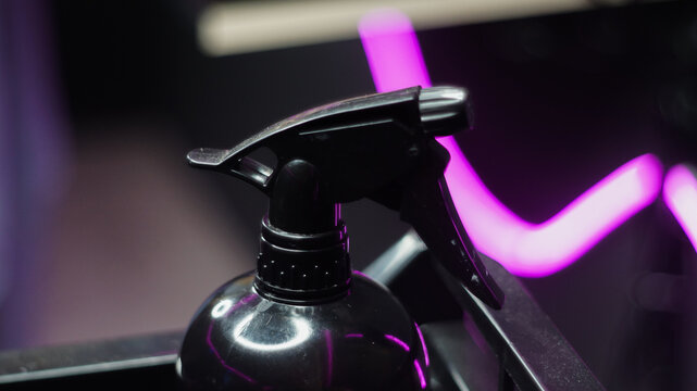 Professional hairdressing accessories and tools on beauty salon workspace tabletop