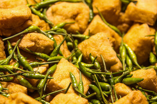 Traditional Tahu Sumedang Crispy Tofu Cubes Deep Fried in Hot Bubbling Cooking Oil