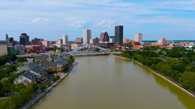 Cinematic Drone Tracking Flight Along Genesee River Toward Downtown Rochester Skyline