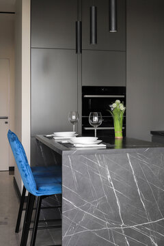 Kitchen island black marble blue chair