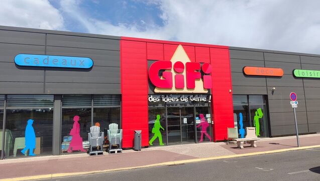 Royan, France - August 10, 2026: New Aquitaine, Charente-Maritime, Centre commercial. GIFI store exterior with colorful signage and silhouettes of people in front, showcasing various products