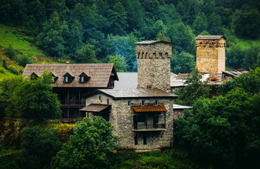 Obraz premium Scenic rainy landscape of Ushguli village with traditional Svan towers. Upper Svaneti, UNESCO world heritage in Georgia.