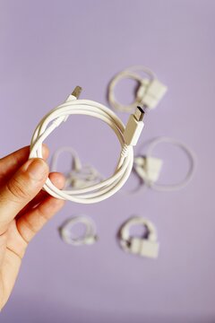White USB chargers. Mobile phone chargers. Smartphone charging accessories, USB power adapters. 