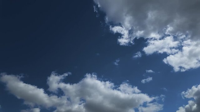 Time lapse clouds 4k rolling puffy cumulus cloud relaxation weather dramatic beauty atmosphere background dynamic pattern sky cloud 