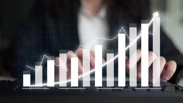 A close-up view of a keyboard with financial growth charts displayed, highlighting the significant upward trend in business productivity and success in modern analysis. Copula