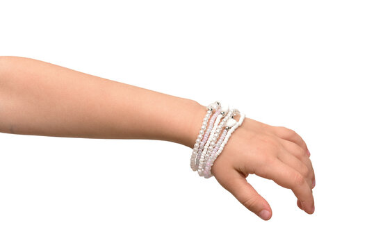 Kid arm with handmade bead jewelry set for fashion boutique mockup isolated on white background