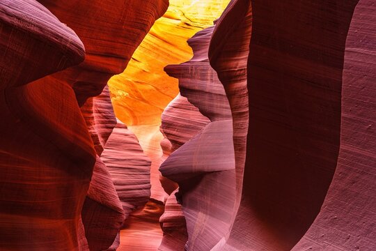 Radiant Slot Canyon &ndash; Sunlit Sandstone Layers in Vibrant Red and Orange Tones