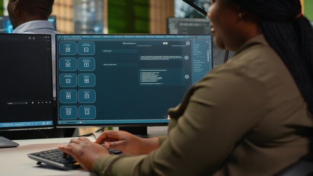 System administrator in office using AI LLM chatbot