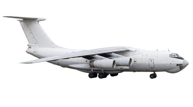 Large white military transport aircraft with four turbofan engines flying in side view isolated on transparent background for aviation industry concept imagery.