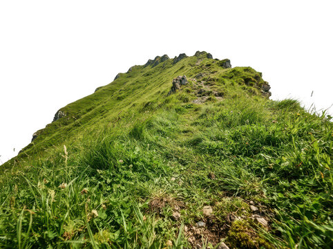 A lush green mountain peak with vibrant grass rocky terrain and scattered stones offering breathtaking views of natures beauty transparent background