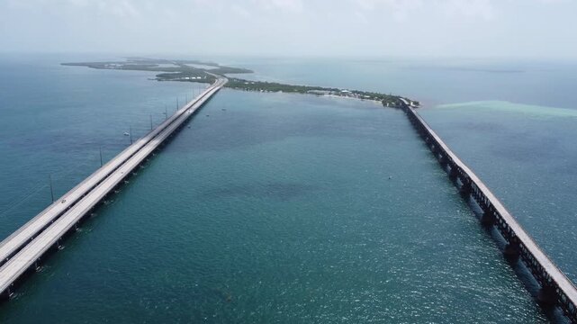 High elevation reversing shot of the Bahia Honda Railroad Bridge 2026 Summer