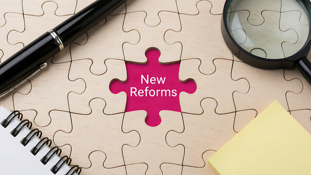 New Reforms Concept Jigsaw Puzzle Piece with Office Supplies on Desk