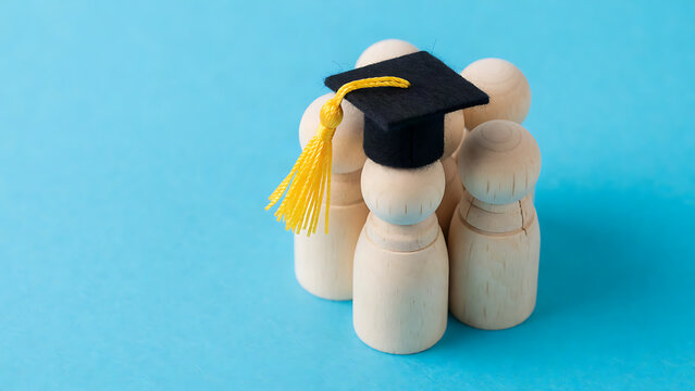 Graduation celebration with baby bottles wearing caps and mortarboard hat