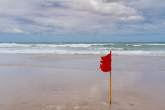 red flag on the beach