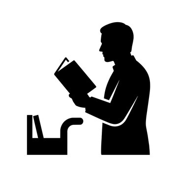 Silhouette of a man reading a book