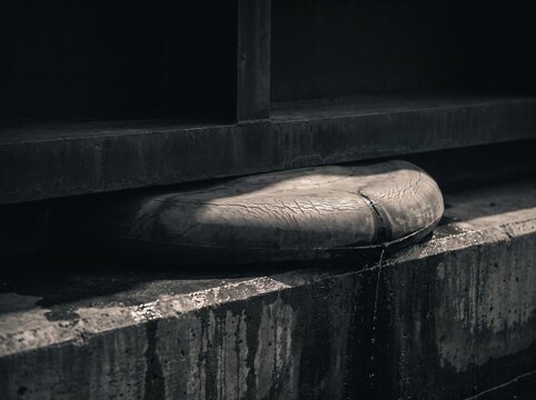 A dock gate seal face bedded hard against its concrete sill