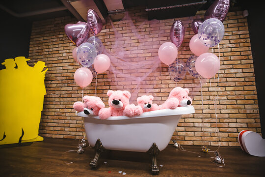 Pink Teddy Bear Bath Time Celebration: A whimsical scene unfolds with several adorable pink teddy bears enjoying a bubble bath in a vintage clawfoot tub.