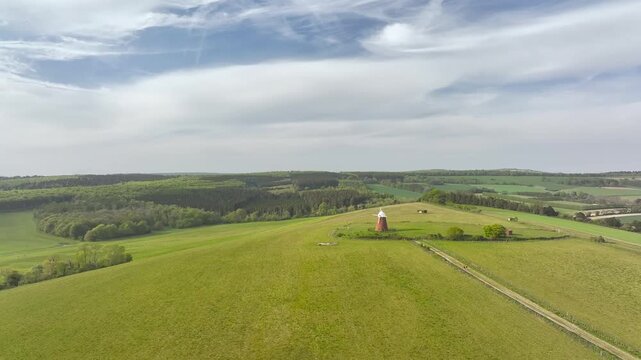 Fields and Farms over Halnaker Hill and the Windmill Trail from a drone, Boxgrove Village, West Sussex, England