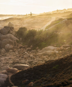 Moody afternoon light with sea spray on the rocks in Port Elliot South Australia looking towards Rocky Bay and Green Bay