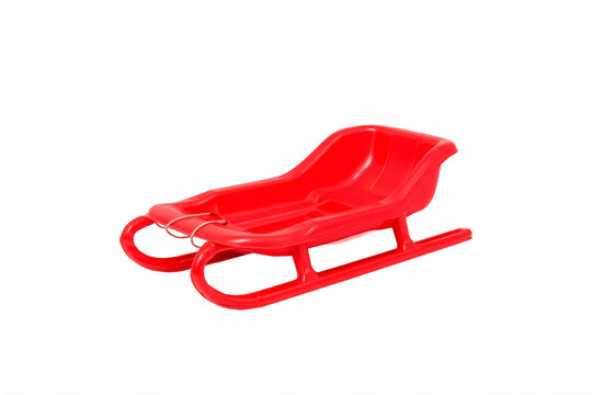 Red plastic winter snow sled isolated on white background winter sport