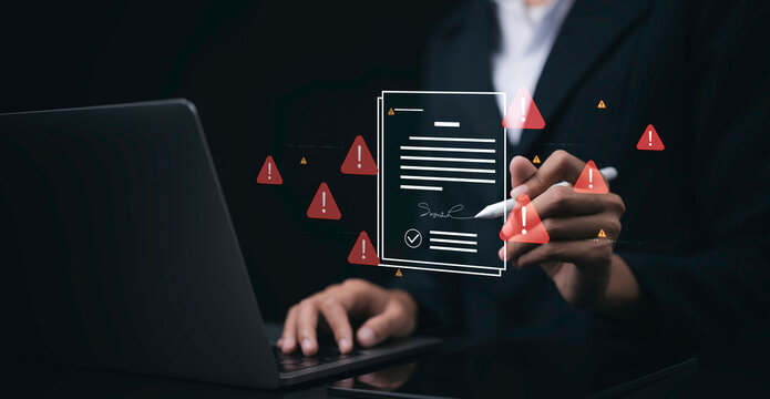 Business professional signing digital contract with laptop and warning icons showing cybersecurity risk legal document compliance data protection fraud prevention and online security concern