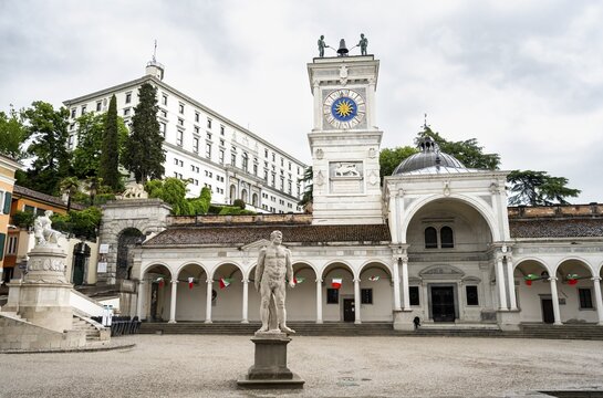 Piazza della Libert&agrave; main square with Loggia e Tempietto di San Giovanni and clock tower, Castello di Udine in the back, old town, Udine, Friuli-Venezia Giulia, Italy