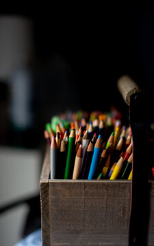 colored pencils in a box