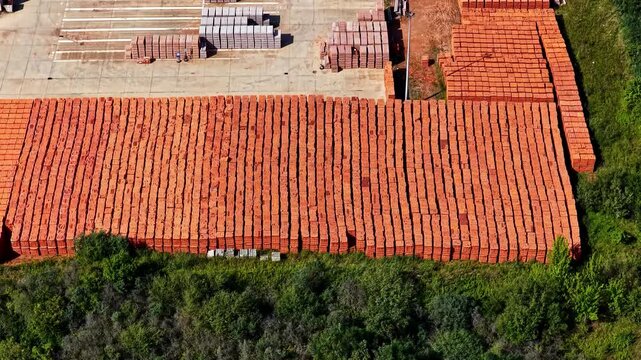 Aerial view of large stacks of red bricks stored at the ZE PAK Patnow Power Plant site in Konin, Wielkopolskie, Poland.