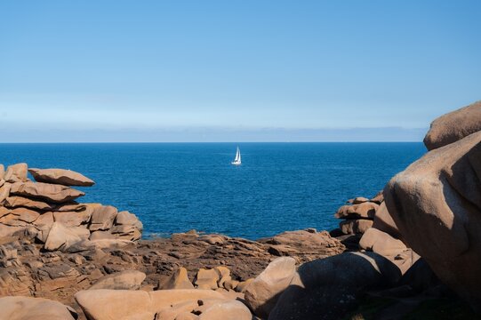 Landscape view from Phare Mean Ruz, yacht at the sea,Ploumanach, Brittany, France. travel destination, tourist attraction