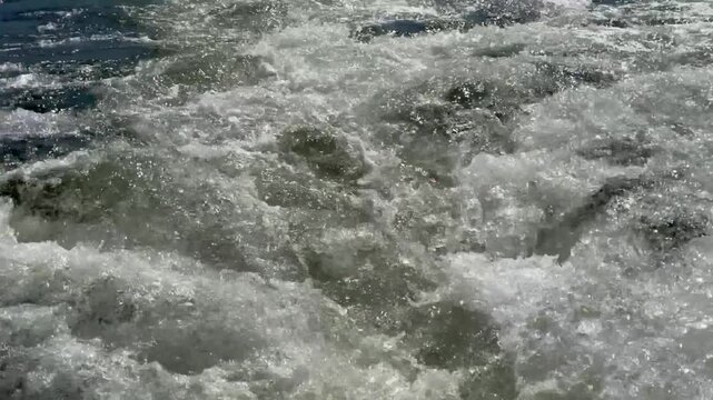 Turbulent rapids water background