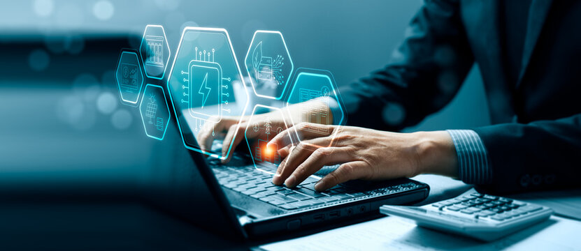 AI data center energy consumption concept with professional using laptop and virtual power chip interface showing servers, smart grid, battery storage and renewable electricity management