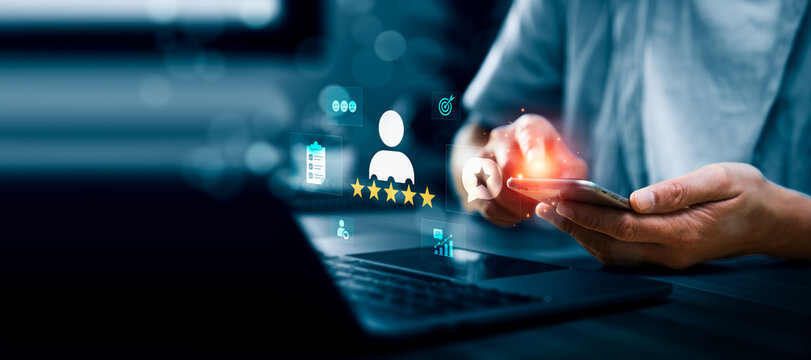 Customer satisfaction feedback concept with person using smartphone and virtual five star review rating interface showing survey checklist, user opinion and service quality analytics