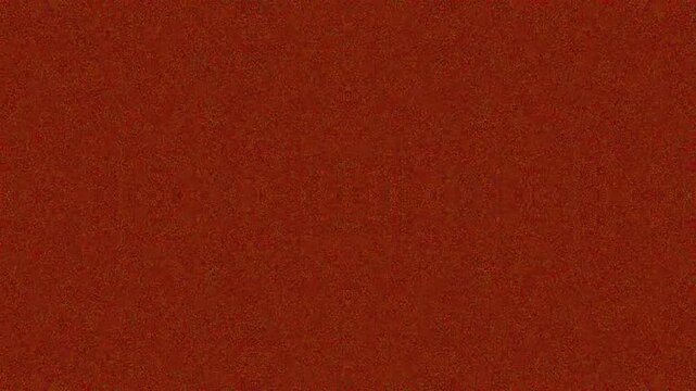 Textured red background with a grainy and rustic appearance